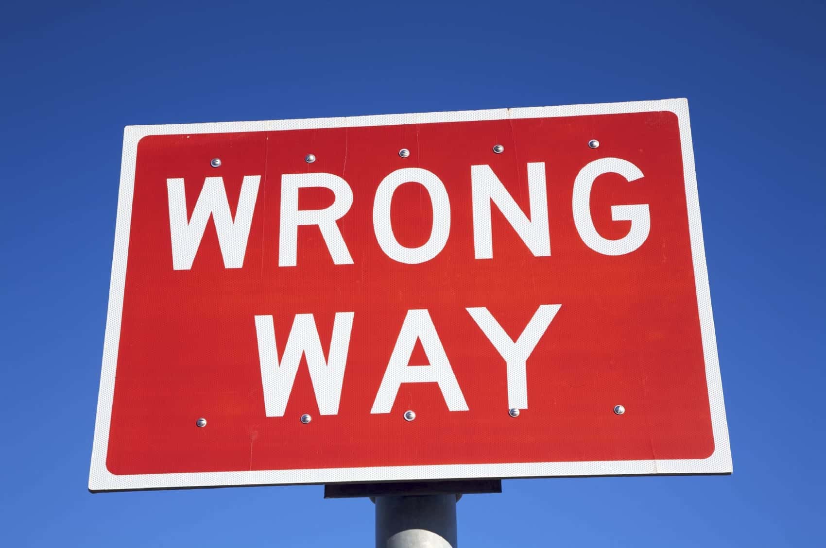 Red Wrong Way Sign Stock Photo