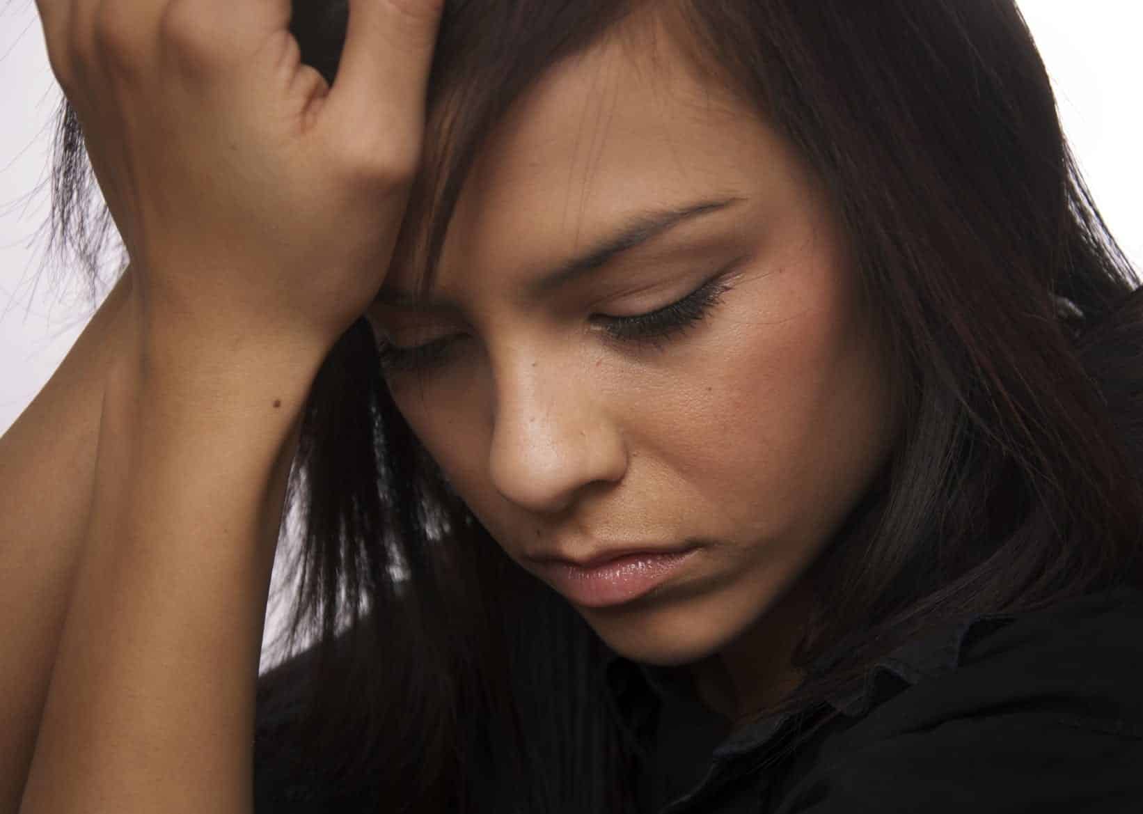 Worried Young Woman Stock Photo