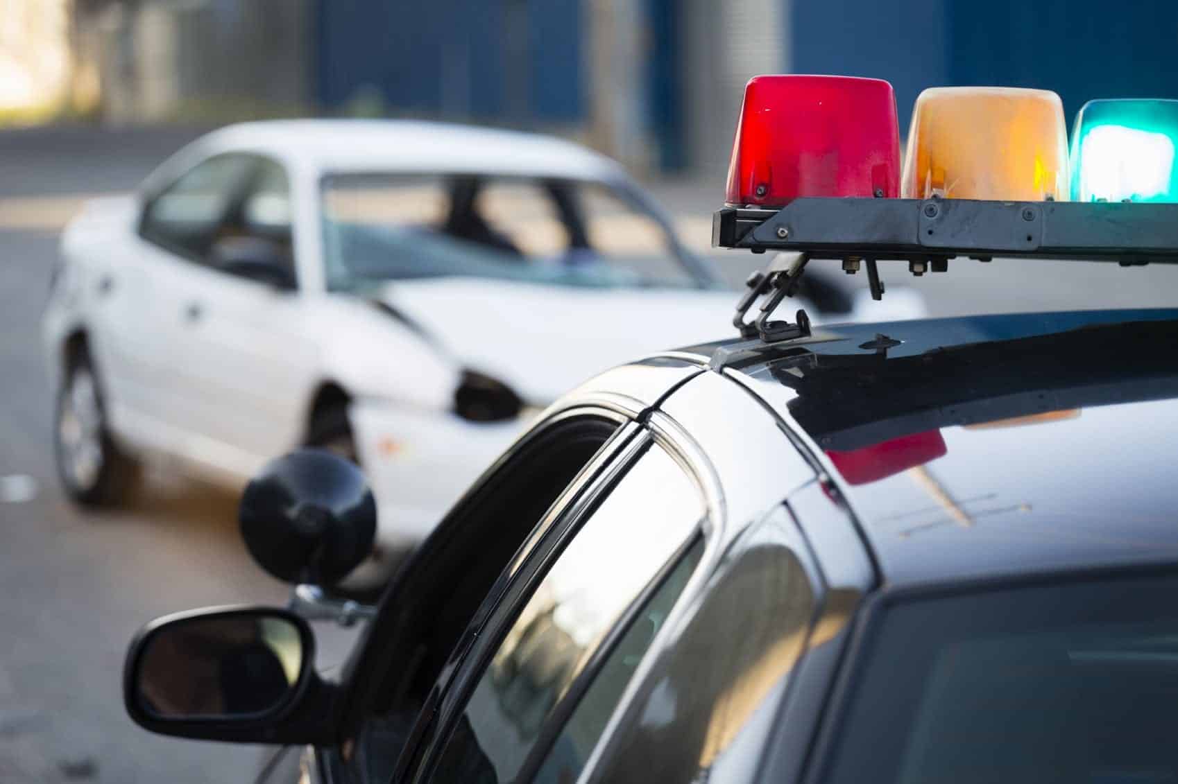 White Car Damaged In Car Accident Stock Photo