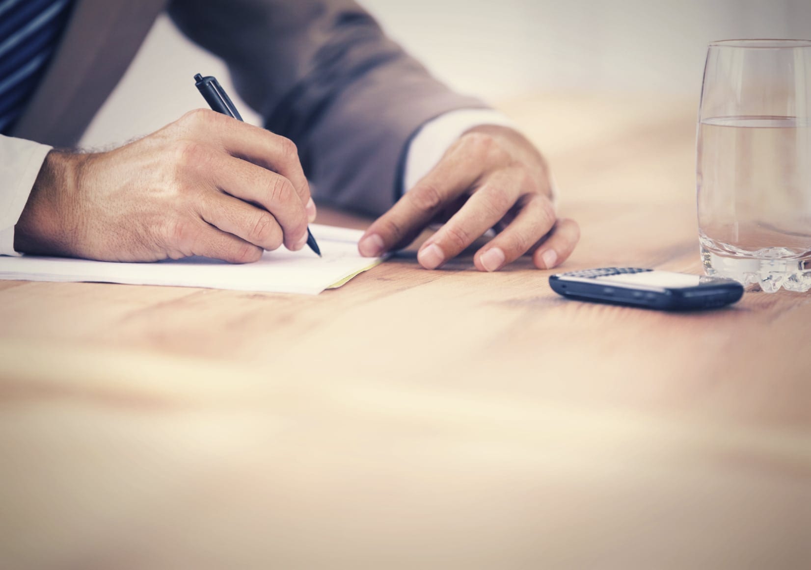 Lawyer Signing Legal Documents Privately Stock Photo