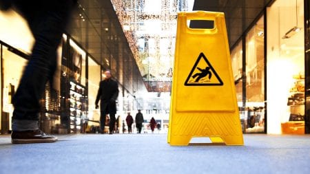 Caution Wet Surface Sign Stock Photo