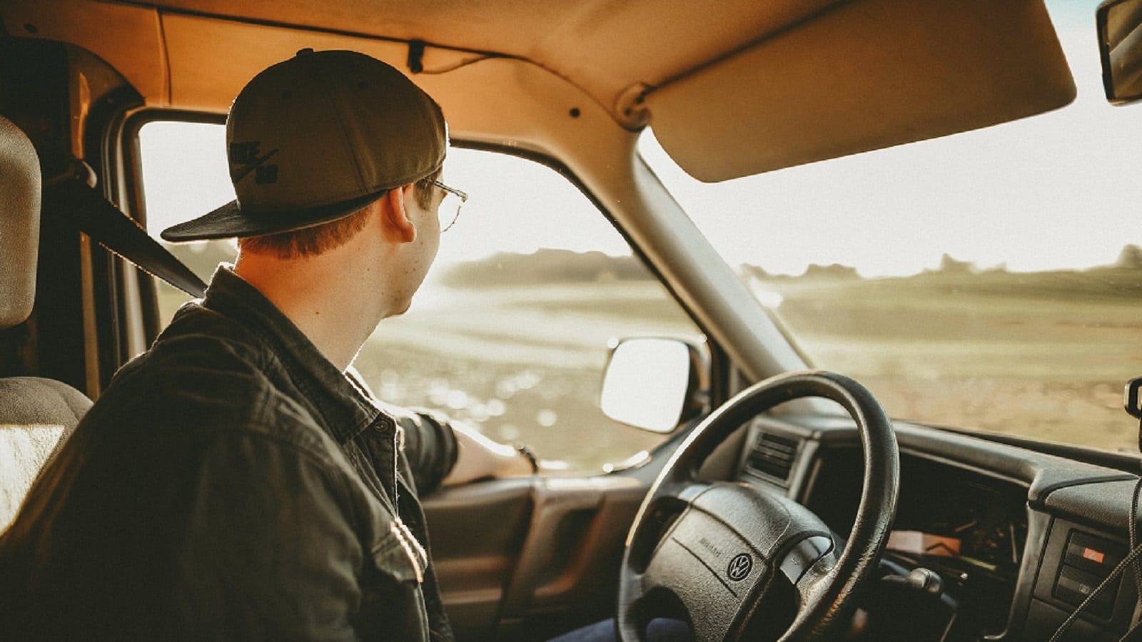 Young Man Driving His Pickup Truck Stock Photo