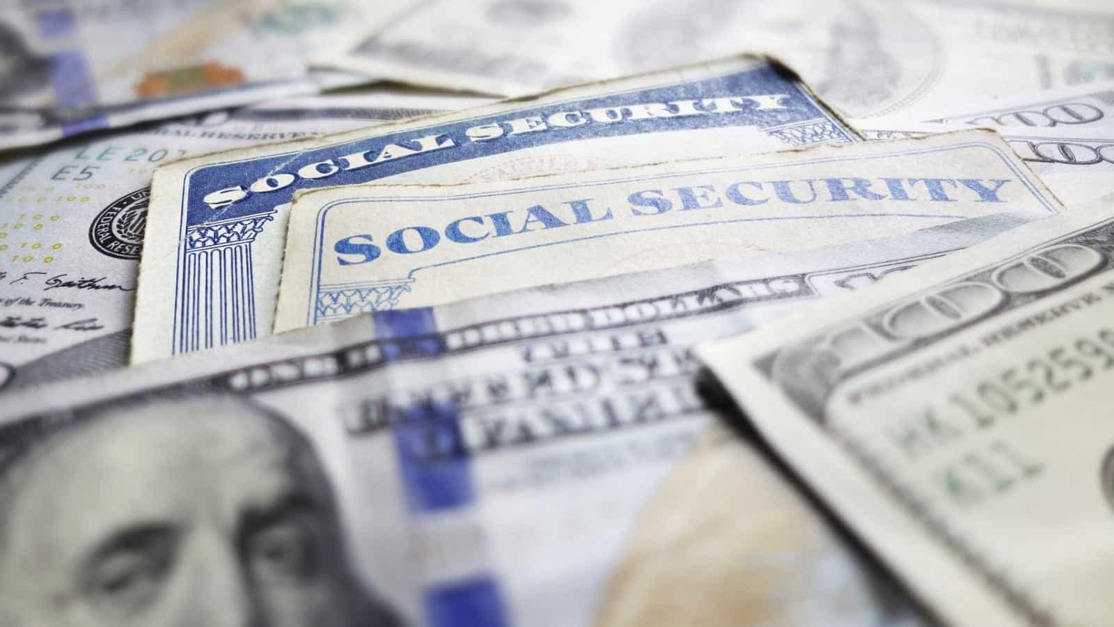 $100 Bills With Social Security Cards Stock Photo