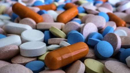 Heap Of Colorful Prescription Pills Stock Photo