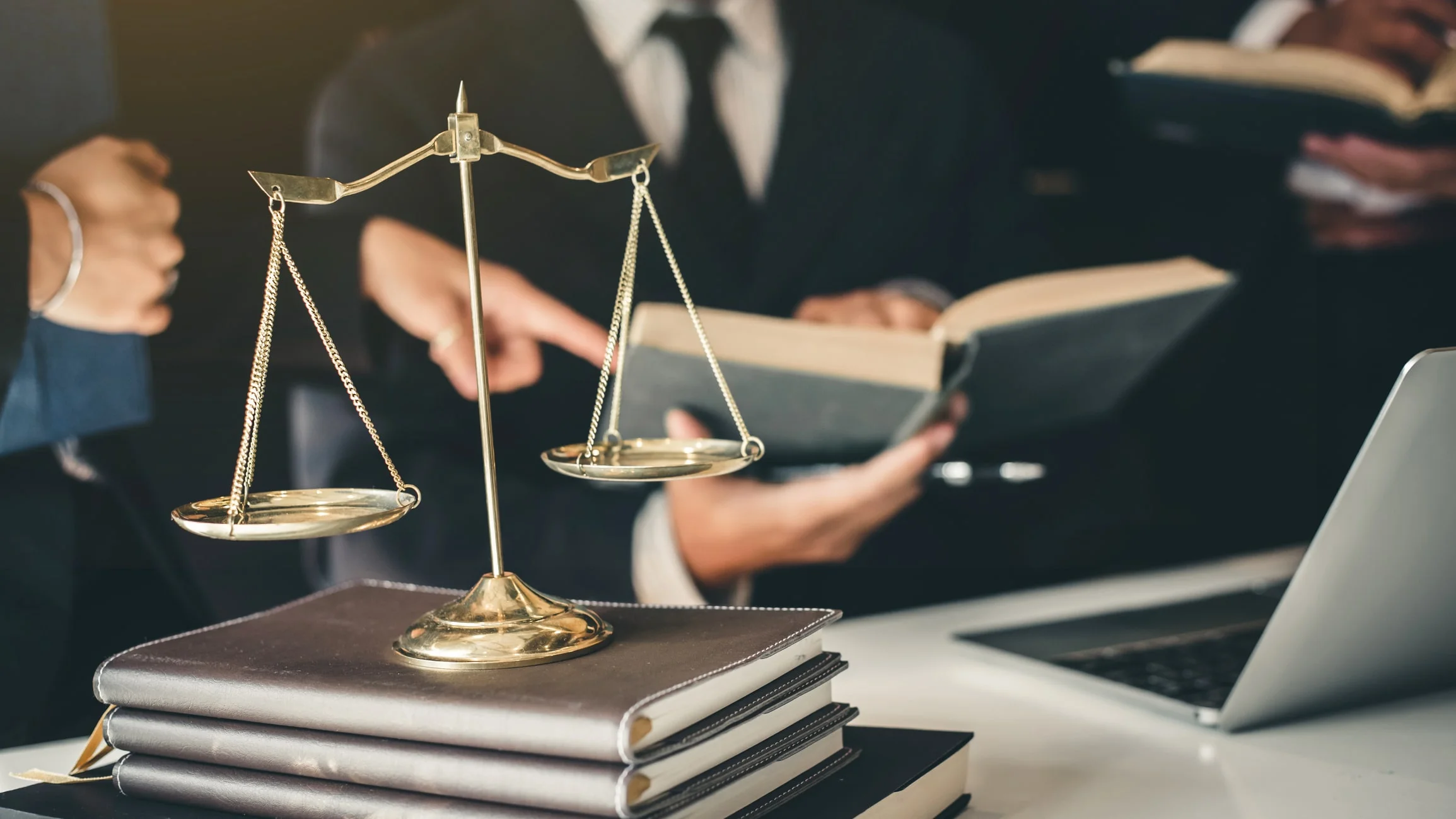 Business lawyer team. Working together of lawyer in the meeting. Not consulting a lawyer when filing a car accident claim in Winston-Salem will cause you to receive less in compensation.