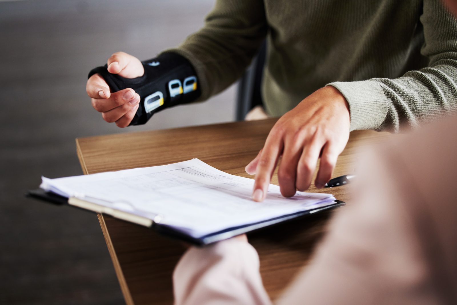 Injured person reviewing the documents